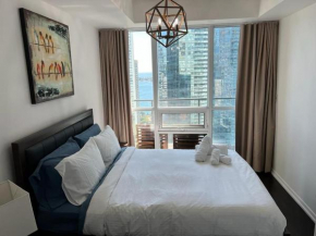 Newly Upgraded 2-Bdrm Condo with 2 bath and extra bed in Den- Next to Scotiabank Arena with Free Parking